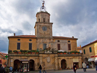 Orbetelo Piazza heritage building with clock