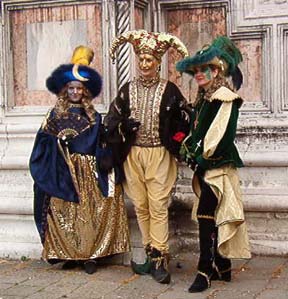 Costumed, masked Carnevale characters on Venice